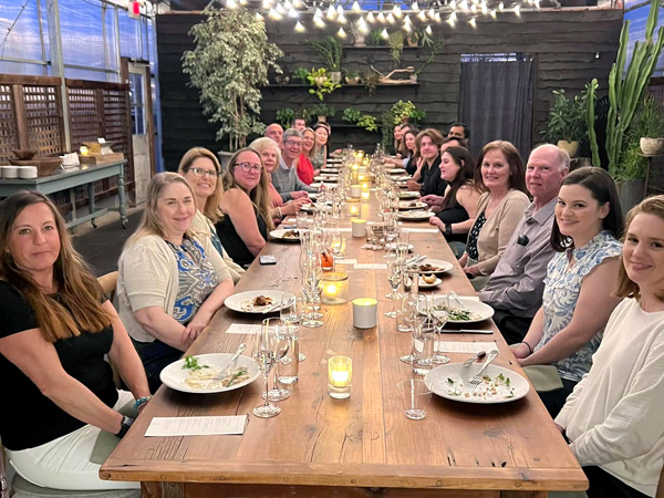 Team dinner showing all the accountants and employees at Umbreit, Wileczek & Associates